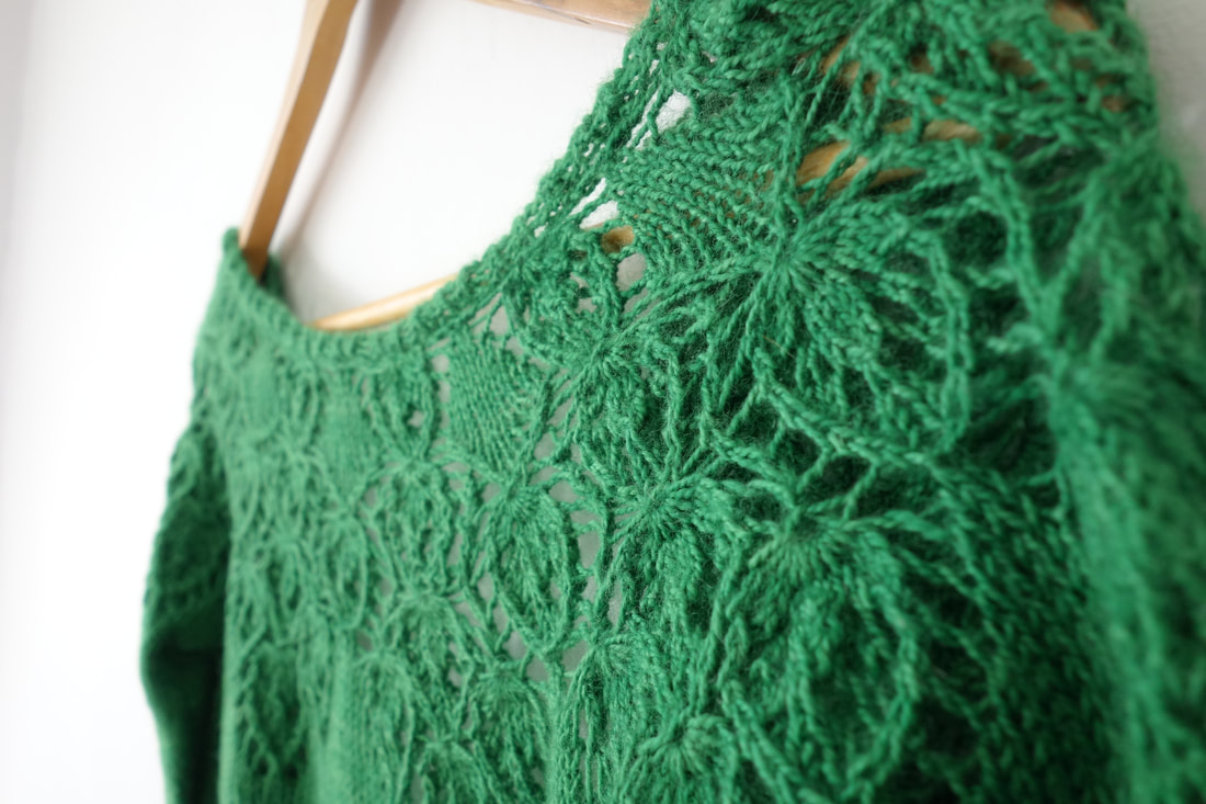 Handknitted lace cardigan