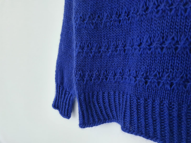 Auldhouse Sweater by Littletheorem Knits. A simple crew neck sweater with a gorgeous modern lace pattern.