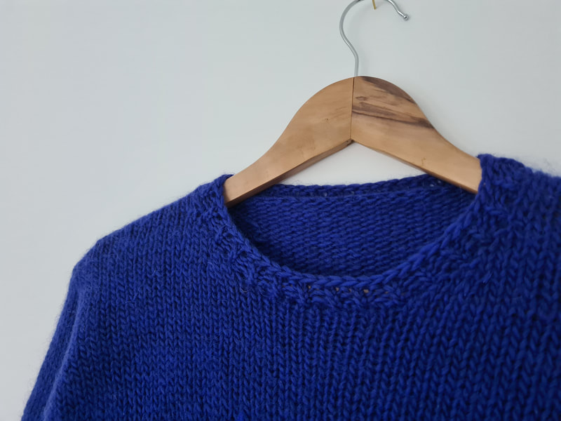 Auldhouse Sweater by Littletheorem Knits. A simple crew neck sweater with a gorgeous modern lace pattern.